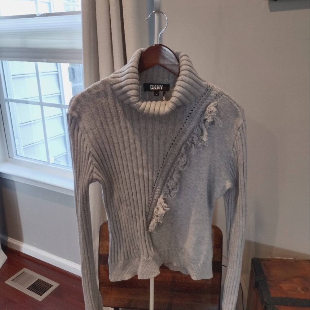 Gray sweater with fringe